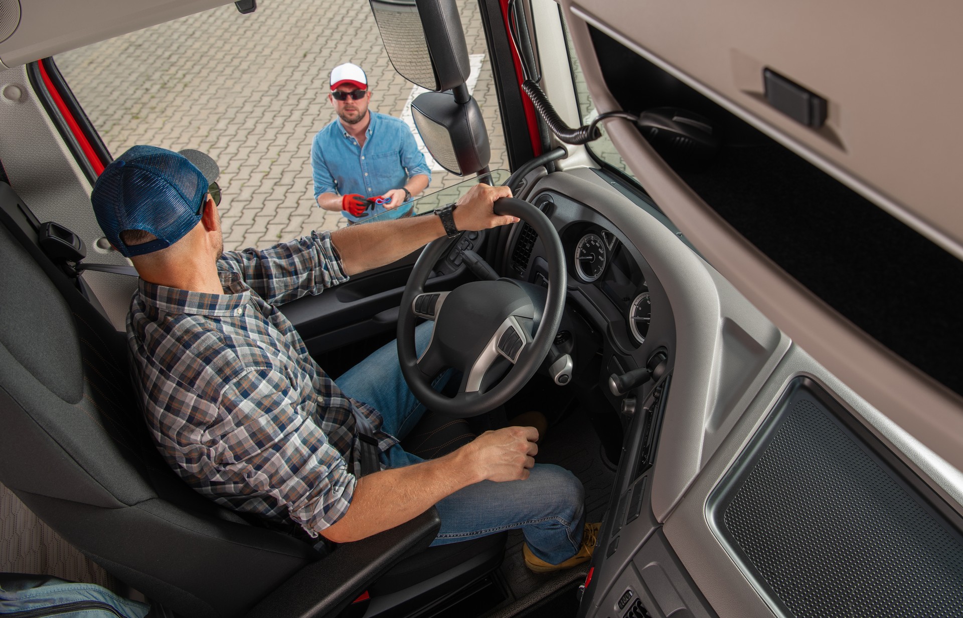 Freight Dispatcher Giving Last Instruction To Semi Truck Driver